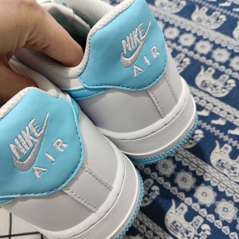 Nike White Sneakers with Light Blue Swoosh - Picture 4 of 6